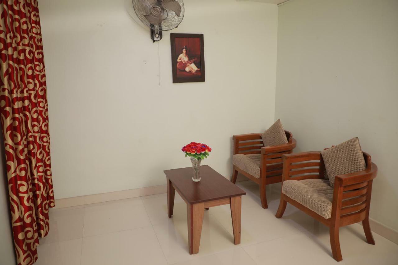 Pavithram Residency Coulão Exterior foto